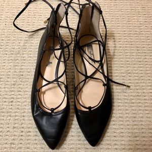 Black pointed flats with wrap tie